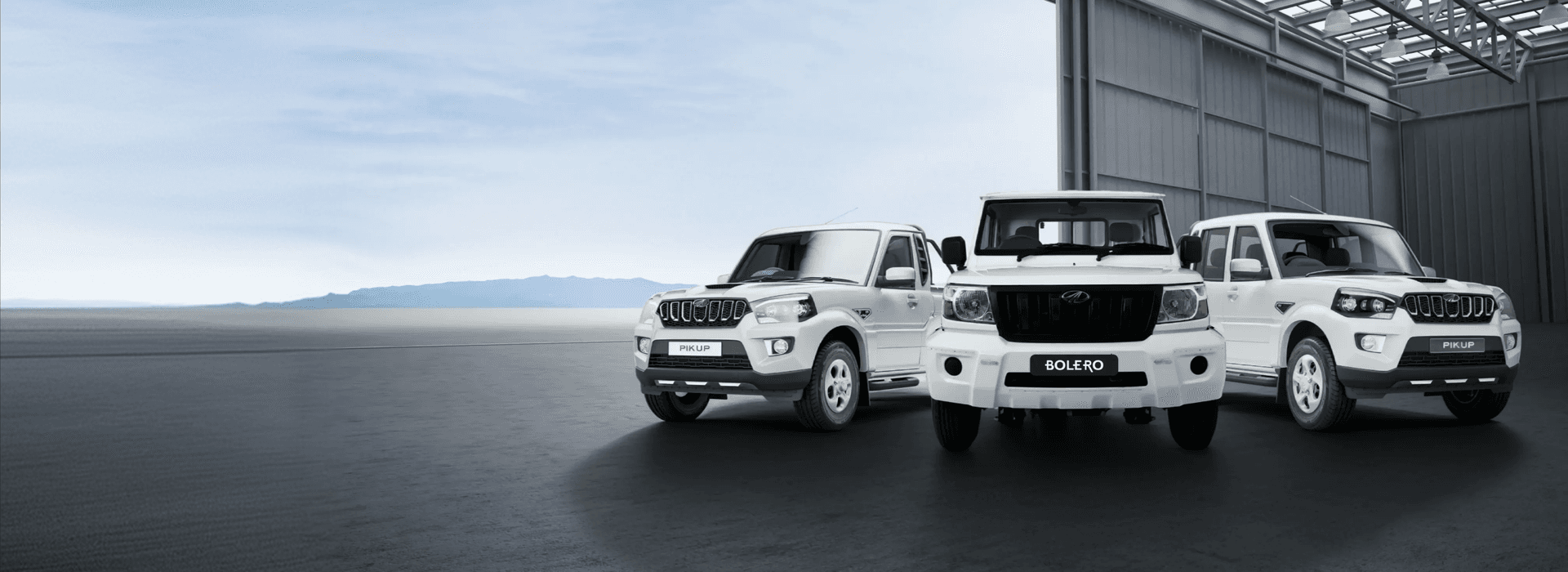 Mahindra fleet vehicle range in an industrial showroom