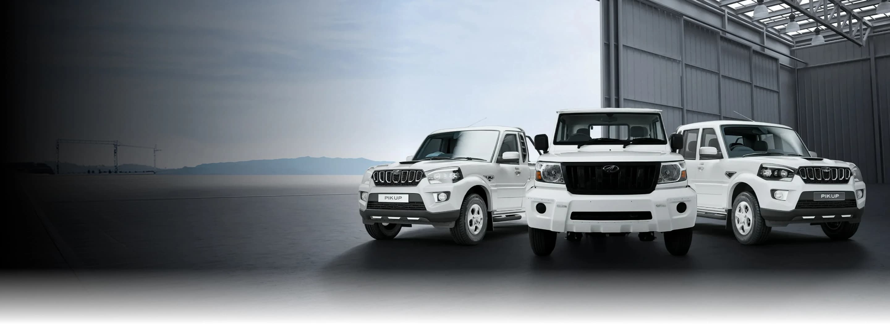 Mahindra fleet vehicle range in an industrial showroom