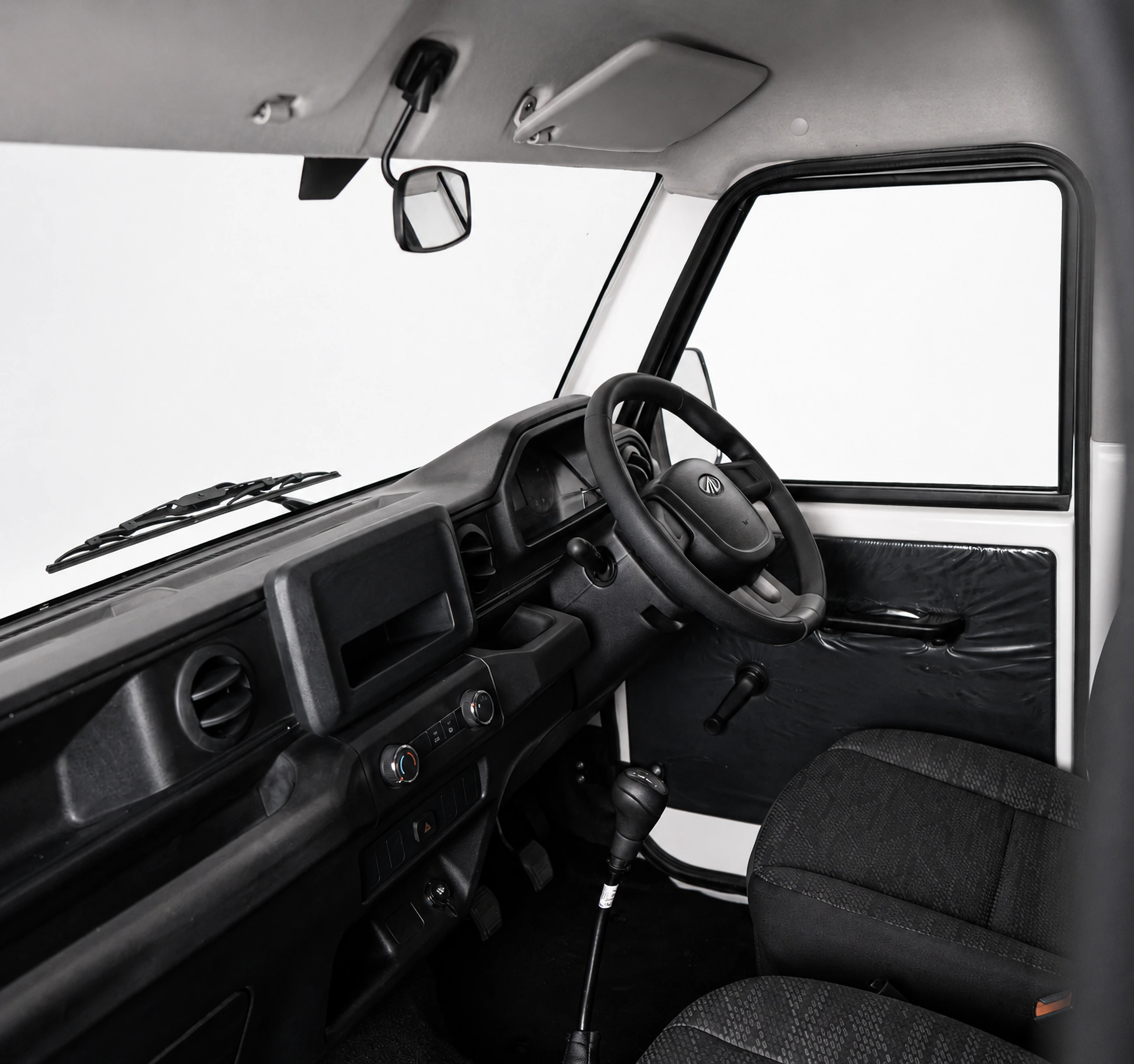 Mahindra Bolero MaXX City control and crew seating