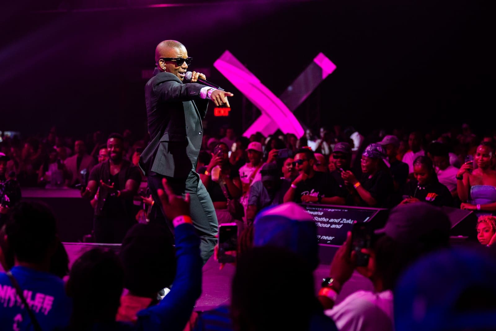 Performer on stage engaging the Fusion Fest crowd